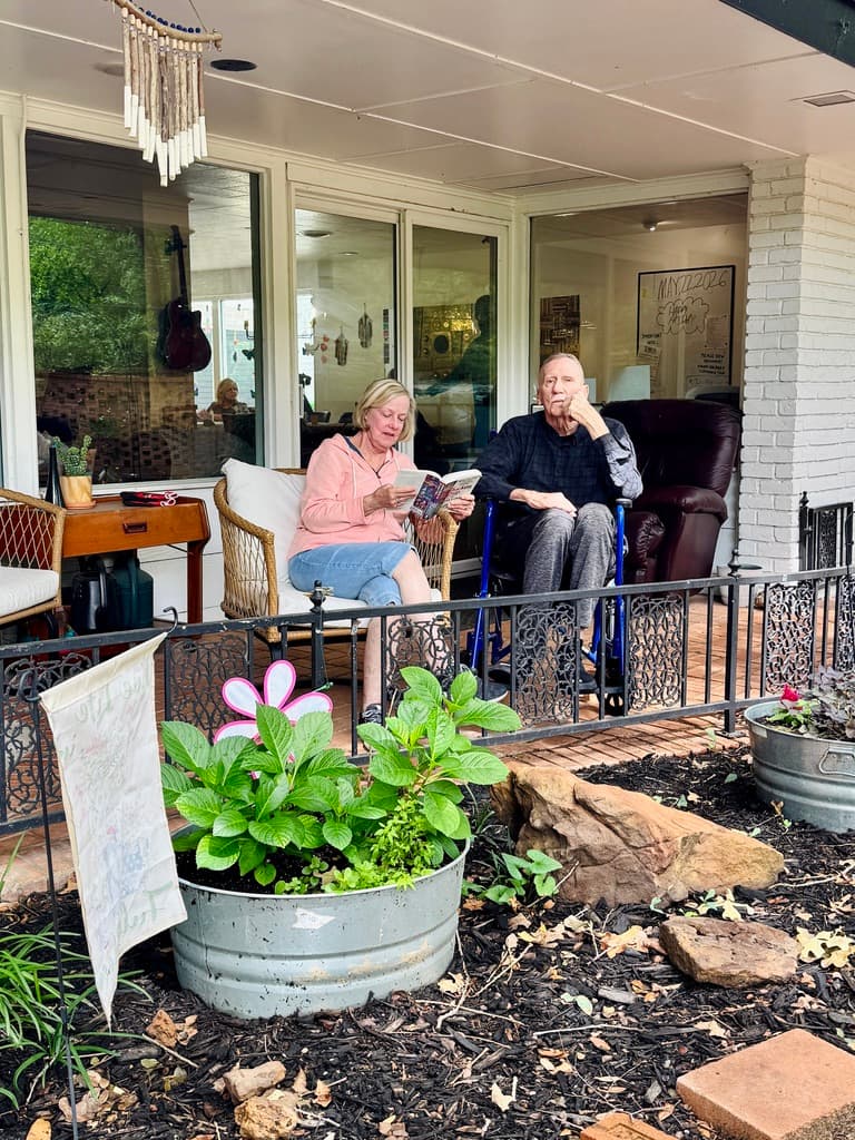 Residents relaxing on the Timeless Care Homes porch